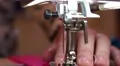 Close up sewing machine needle with pink thread in action HD Footage