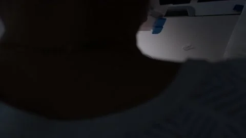 The close-up of the sewing machine needle in slow motion. The seamstress sews Stock Footage 220928365