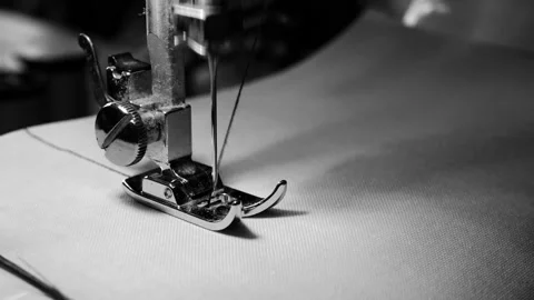 Close up of sewing machine needle on white fabric with slow motion Stock Footage 134148875