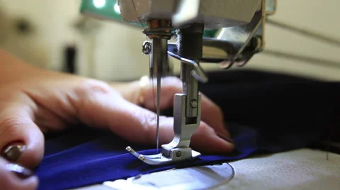 Close up on a sewing machine showing process Stock Footage 42752889