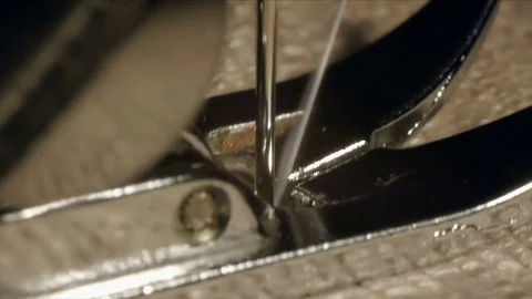 Close up on a sewing machine showing process Stock Footage 71316129