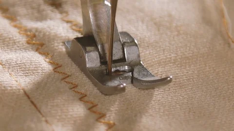 Close up on a sewing machine showing process Stock Footage 78773089