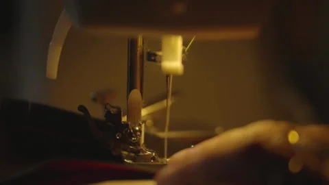 Close-up of sewing machine stitching fabric Stock Footage 346055962