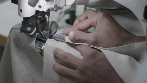 Close-Up of Sewing Machine in Textile Factory, Bangladesh Stock Footage 142032966