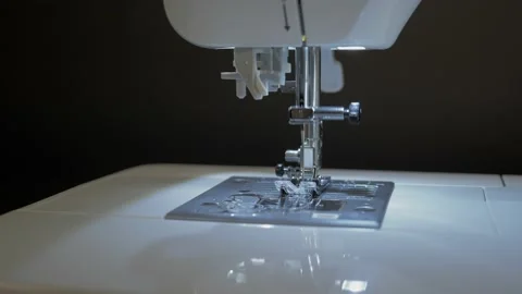 Close-up of a sewing needle moving in a sewing machine. Stock Footage 150467094