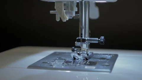 Close-up of a sewing needle moving in a sewing machine. Stock Footage 150467108