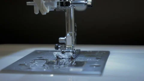 Close-up of a sewing needle moving in a sewing machine. Stock Footage 150467109