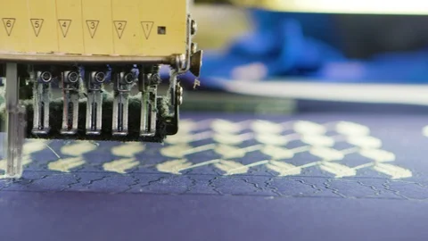 Close up of sewing process in a modern fabirc factory Stock Footage 118743793