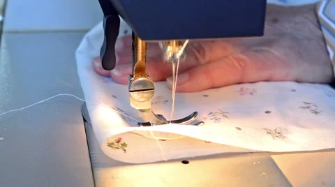 Close-up of sewing on the sewing machine.  Stock Footage 61872680