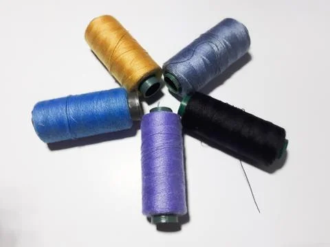 Close up sewing thread isolated white Stock Photos
