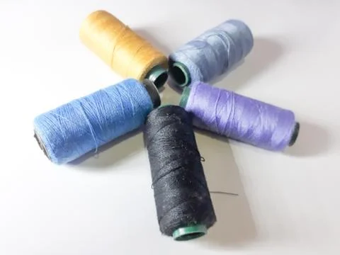 Close up sewing thread isolated white 스톡 사진