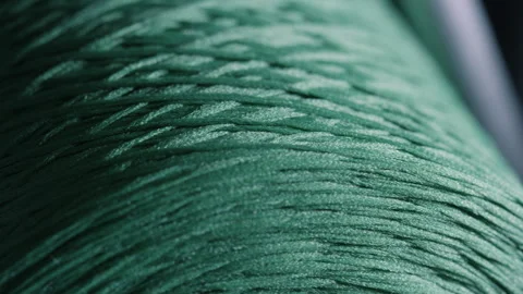 Close Up Of Sewing Thread Spool Being Unwound Stock Footage 265560236