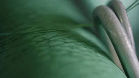 Close Up Of Sewing Thread Spool Being Unwound Stock Footage 265560392