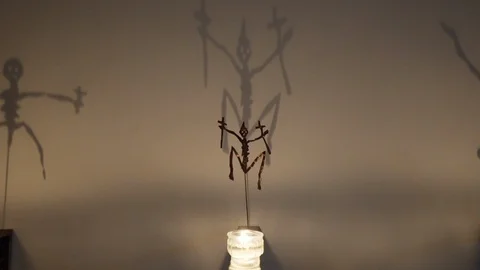 Close on shadow sculpture in dark room Stock Footage 121753915