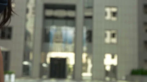 Close-up of shaking hands after a business meeting in front of office Stock Footage 66365874