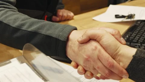 Close-up of shaking hands after a successful agreement in the office Stock Footage 281581696