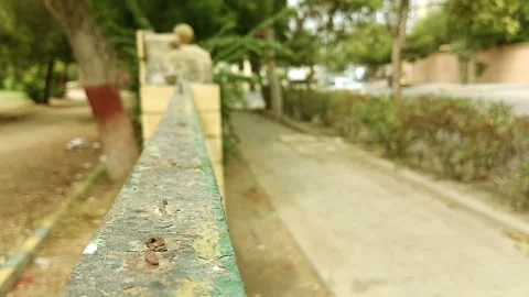 Close up shallow depth of field old green metal park fence rail walkway Stock Footage 341683657