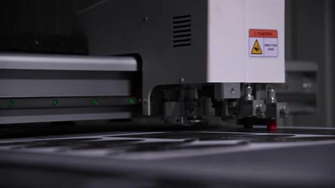 Close-up shallow depth of field a production plotter at a printing house Stock Footage 165914531