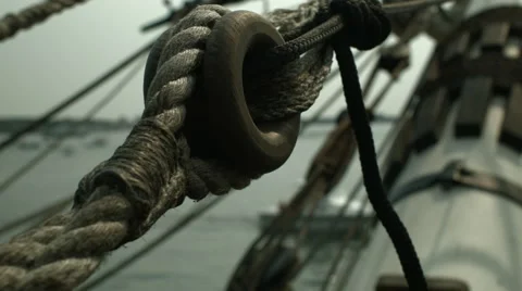 A close up shallow depth of field of  ropes masts and spars on a sailing ship Stock Footage 61280801