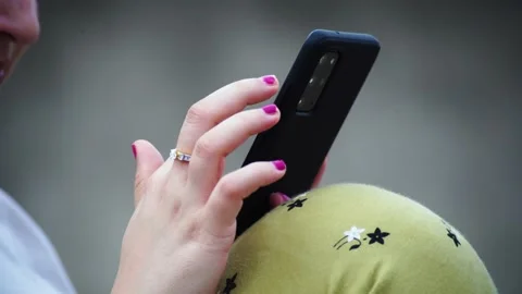Close shallow depth of field shot showing indian woman with nailpaint working Stock Footage 158540135