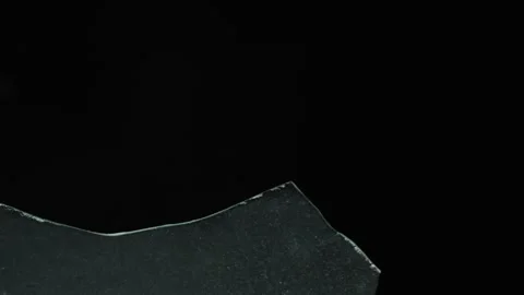 Close up of sharp broken glass edge Stock Footage 310586599