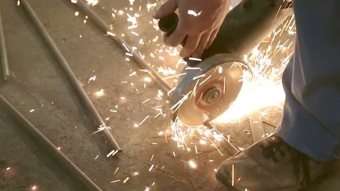 Close-up of sharp metal and sparks a lot of shoes. Violation of safety Stock Footage 77033193