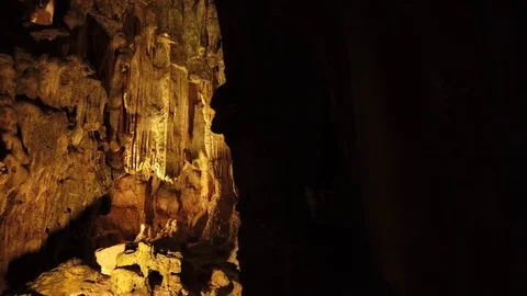 Close sharp stalactites stalagmites rocks Surprise cave pattern grotto Vietnam   Stock Footage 106985236