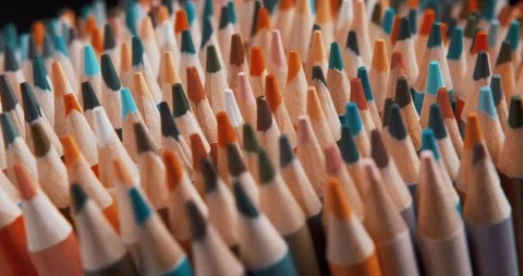 Close-up of Sharpened Colored Pencils Spinning in a Circle. Stock Footage 251836578