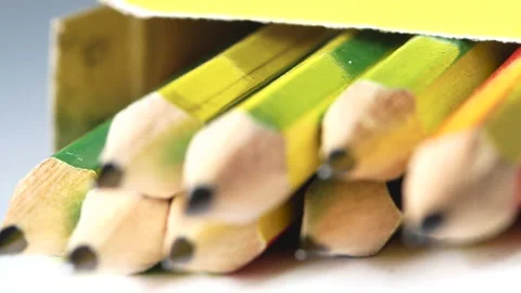 Close-up of sharpened pencils in open cardboard box. Many pencils for drawing. Stock Footage 145679959