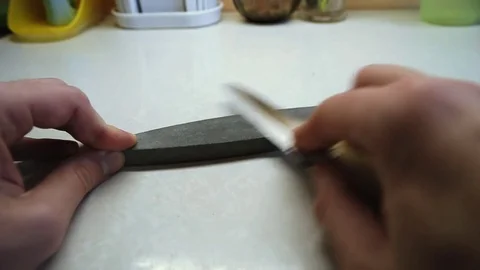 Close-up sharpening knifek Stock Footage 85162977