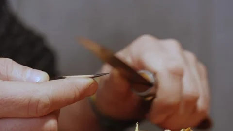Close-up. sharpening a simple pencil with a knife. the sound of carpentry tools Stock Footage 156669525