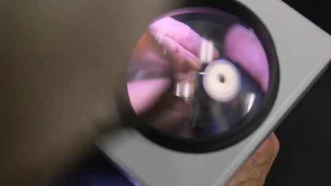 Close-up of a sharpening small scissors Stock Footage 302351562