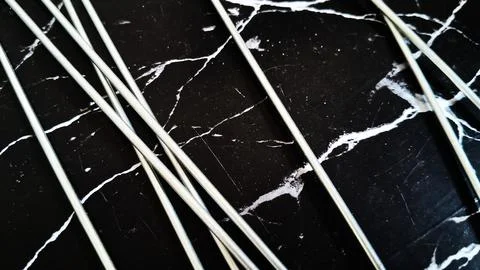 Close-up of shattered glass with sharp cracks and splinters. Abstract broken Stock Photos