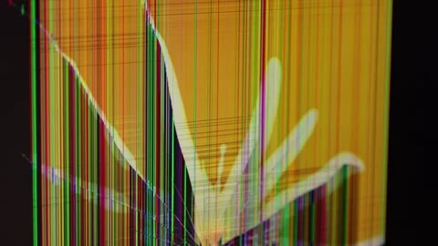 Close-up of a shattered LCD display with colorful vertical pixel lines and .. Stock Footage 324964598