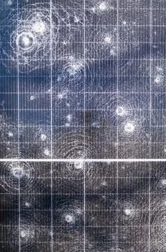 Close-up of shattered solar panel surface with multiple impact cracks and d.. Stock Photos