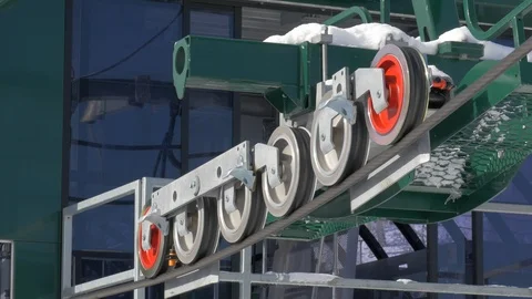 Close-up of sheave wheels rotating on a ski lift, Park City, Utah. Stock Footage 120210625