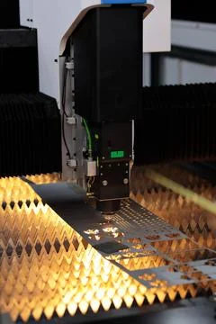 Close up of sheet metal cutting process Stock Photos