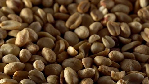 Close up of shelled peanuts rotating. Stock Footage 70225285