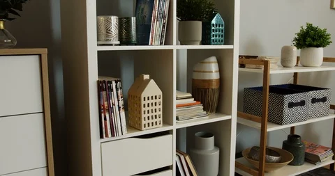 Close up of the shelves with different home stuff in the living room. modern Stock Footage 90387443