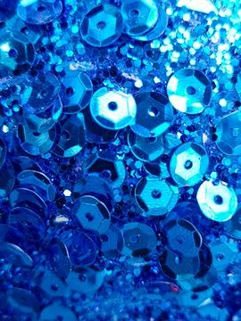 Close-up of shimmering blue sequins. Stock-Fotos