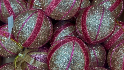 A close-up of shimmering silver red balls Christmas ornaments in a box Stock Footage 289965962