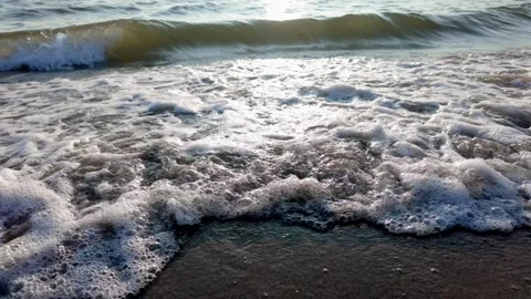 Close Up of Shimmering Waves at Lake Hamana in Backlight Stock Footage 340414327