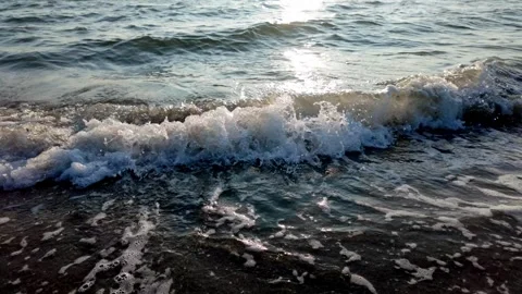 Close Up of Shimmering Waves at Lake Hamana in Backlight Stock Footage 340414337