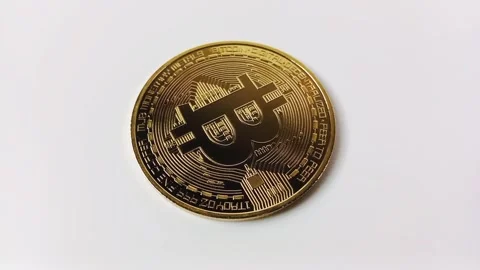 Close-Up of shiny bitcoin. Crypto currency coins on white background Stock Footage 329081005