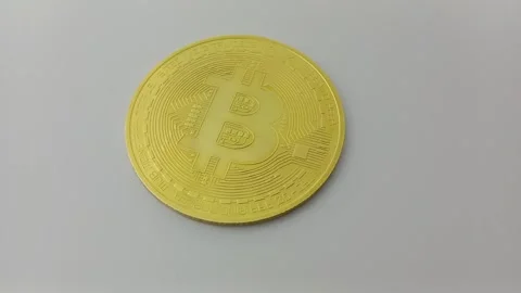 Close-Up of shiny bitcoin. Crypto currency coins on white background Stock Footage 329081008