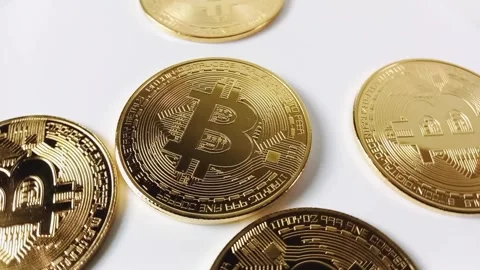 Close-Up of shiny bitcoin. Crypto currency coins on white background Stock Footage 329081015