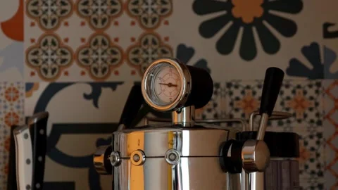 Close-up of a shiny chrome espresso machine with a built-in temperature gau.. Stock Footage 342793182