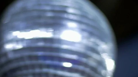 Close-up of shiny disco ball with mirror reflections and rays in haze. Stock Footage 82222274
