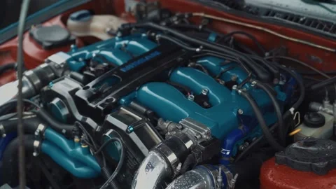 Close Up of Shiny Nissan Engine Under Hood of Luxury Sports Car, Detail Stock Footage 149312619