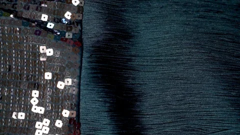 Close-up of shiny sequins on fabric for decorating fashionable luxury evening we Stock Footage 122246593